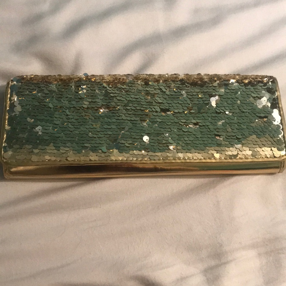 ALDO clutch with metal strap